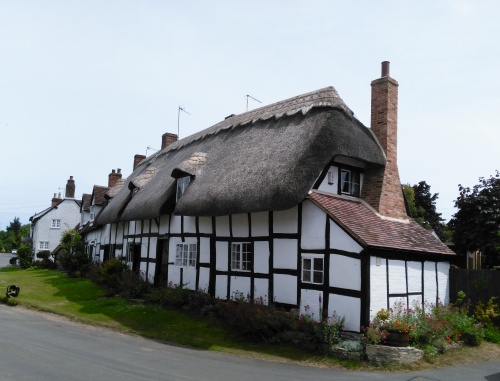 thatched timber framed cottage