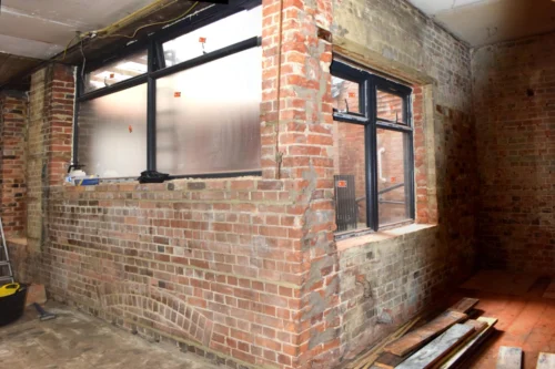 Modern windows in a historic wall